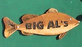 Carved door sign for ice fishing hut
